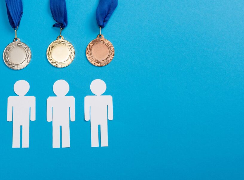 top-view-of-white-paper-cut-people-near-silver-and-2024-11-13-17-06-58-utc top-view-of-white-paper-cut-people-near-silver-and-2024-11-13-17-06-58-utc